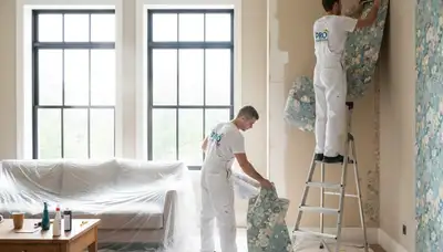 Professional wallpaper removal service in Minneapolis MN preparing walls for fresh interior painting